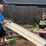 Volunteer and homeowner working together